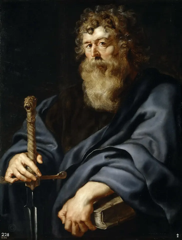 Bearded St. Paul in a dark blue cloak with his hands resting on the hilt of a sword and a closed book