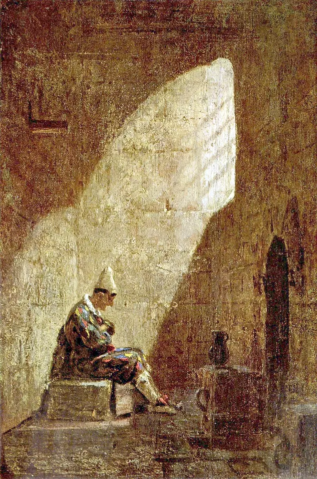 A clown in a red and white carnival costume sits alone and dejected on a stone bench in a bare prison cell lit by a single shaft of light from a high window