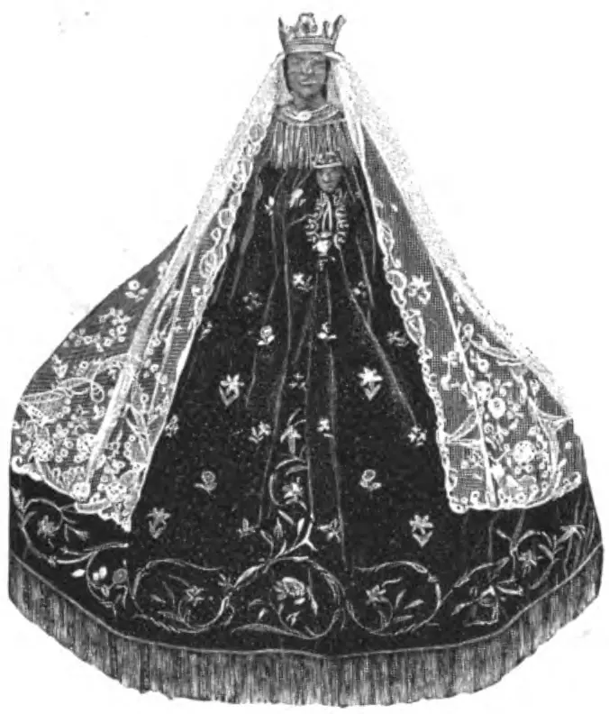 Black-and-white engraving of a crowned, dark-faced statue of the Virgin wearing a wide embroidered robe and a long lace veil