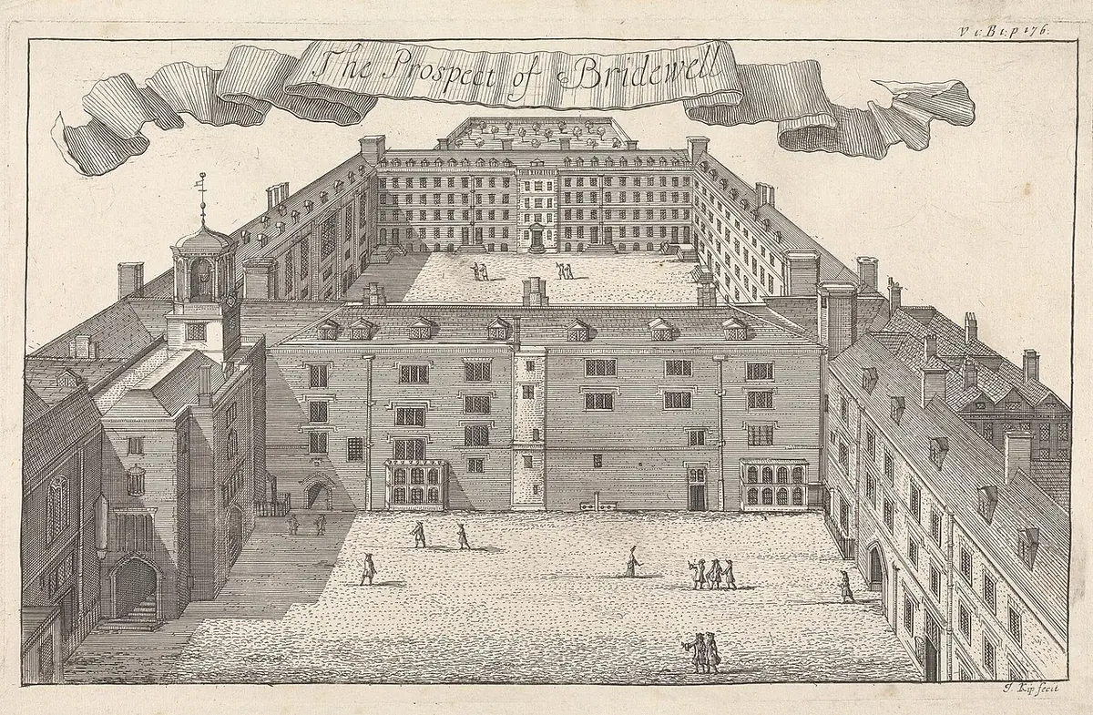 An engraved bird's-eye view of Bridewell in London, a large rectangular courtyard enclosed by tall many-windowed ranges, with small figures crossing the yard