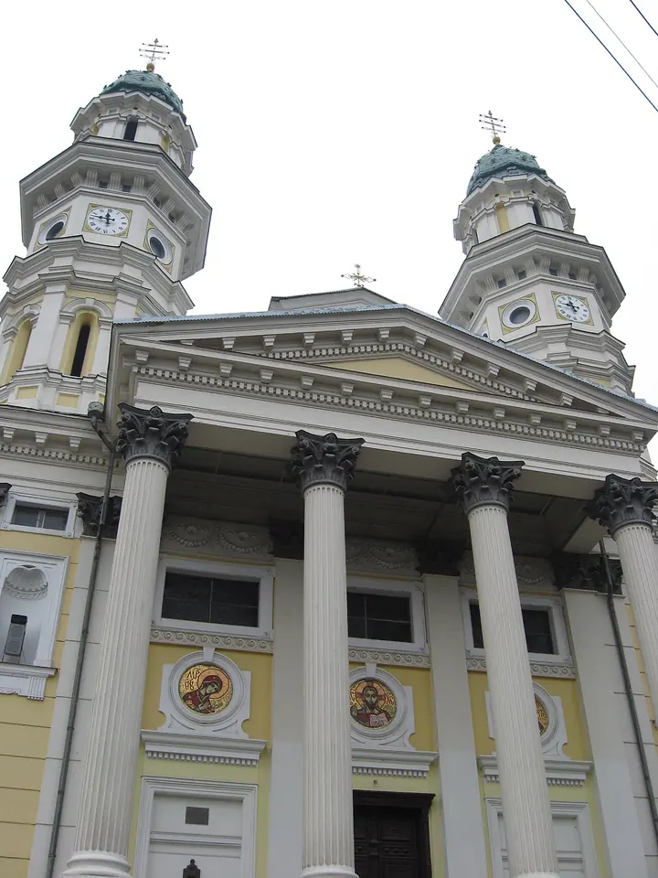 The columned portico and twin towers of the yellow and white Greek Catholic cathedral in Uzhhorod