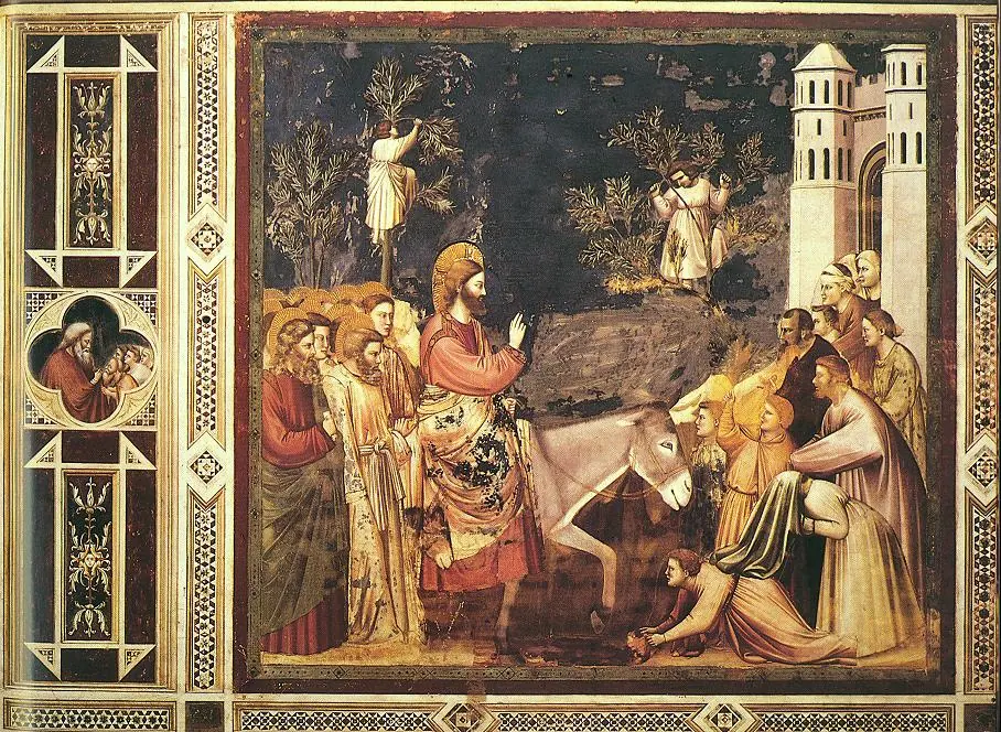 Christ rides a donkey toward the gate of Jerusalem while a crowd comes out to meet him, some spreading their cloaks on the road and boys climbing trees to cut branches