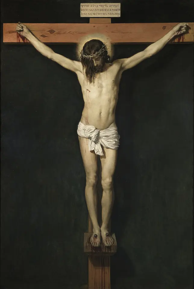 Cristo crucificado sobre un fondo oscuro y liso, con los pies clavados por separado sobre un pequeño soporte, la cabeza inclinada y parte del rostro cubierto por el cabello
