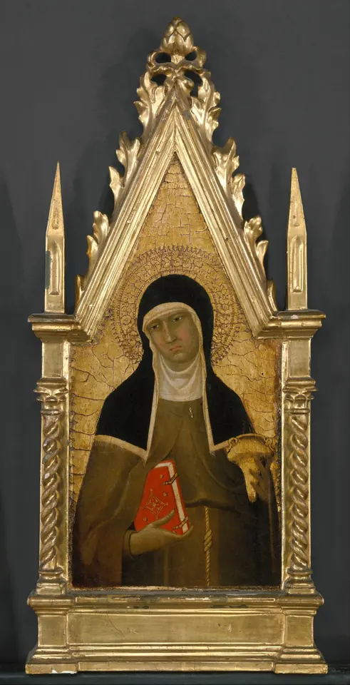 Gothic gold panel of St. Clare in a brown habit and black veil, holding a small red book, inside a pointed gilded frame
