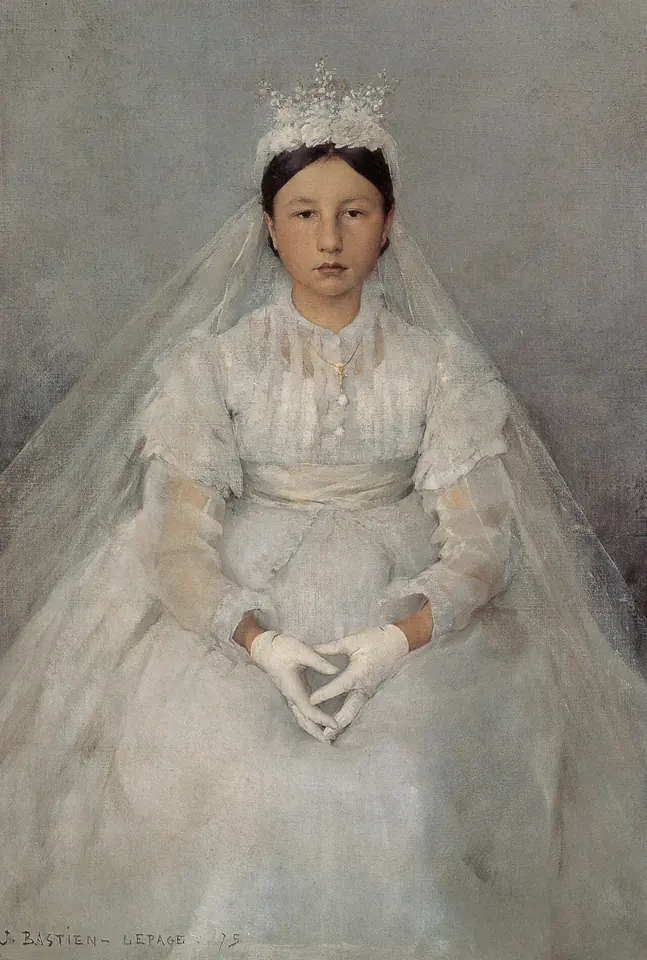 Portrait of a solemn young girl seated in a white First Communion dress, long veil and white gloves, her hands folded in her lap against a pale gray background