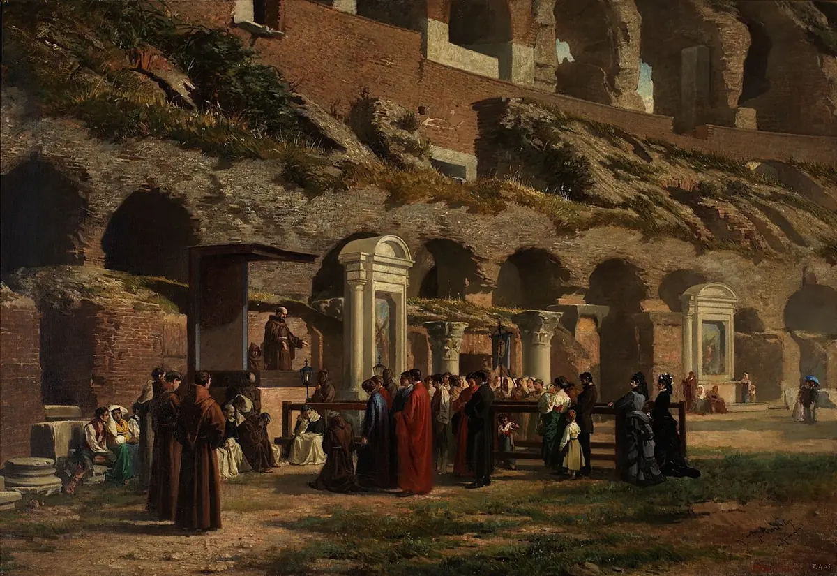 Painting of friars and townspeople gathered among the ruined arches of the Colosseum in Rome, kneeling before one of the small shrines of the Stations of the Cross set around the arena