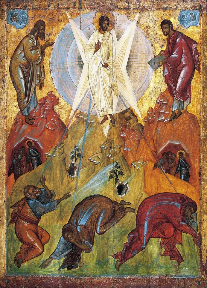 Icon of Christ in white on a mountaintop inside a pale blue circle of light with sharp white rays, Moses and Elijah on either side, and three apostles thrown to the ground below
