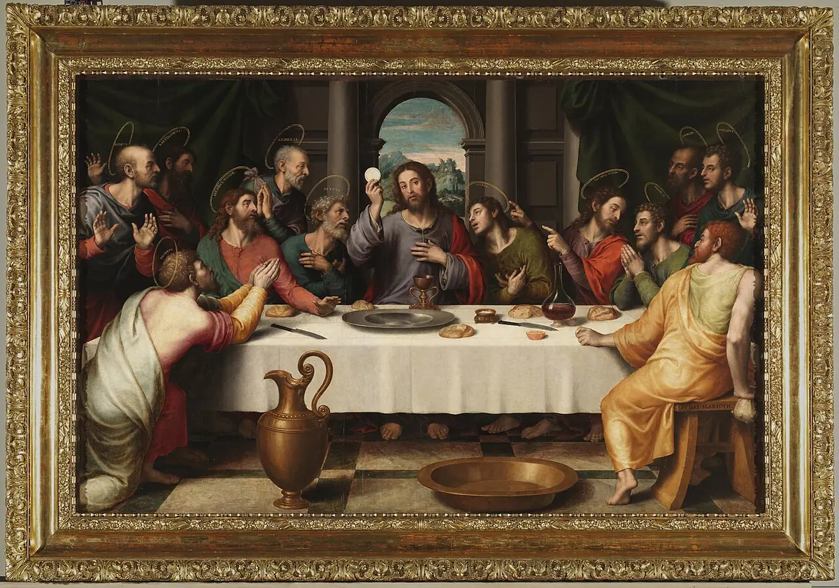 Renaissance painting of Christ at the center of a long table holding up the Host, with the apostles around him, a chalice before him and a jug and basin on the floor