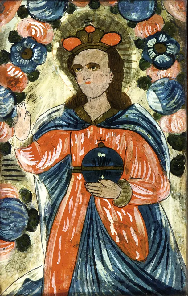 A folk painting on glass of the crowned Christ Child in an orange robe and blue mantle, holding a dark orb with a cross, framed by large stylized flowers