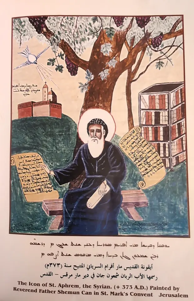 Painted icon of St. Ephrem in a dark monastic habit and halo, seated beneath a grapevine with a scroll in his hand, a church and a bookcase behind him, with Syriac, Arabic and English inscriptions below