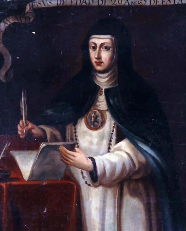 Painting of a nun in a black veil, white habit and dark blue mantle, with a large oval medallion on her breast, writing with a quill on a large book at a red-covered desk