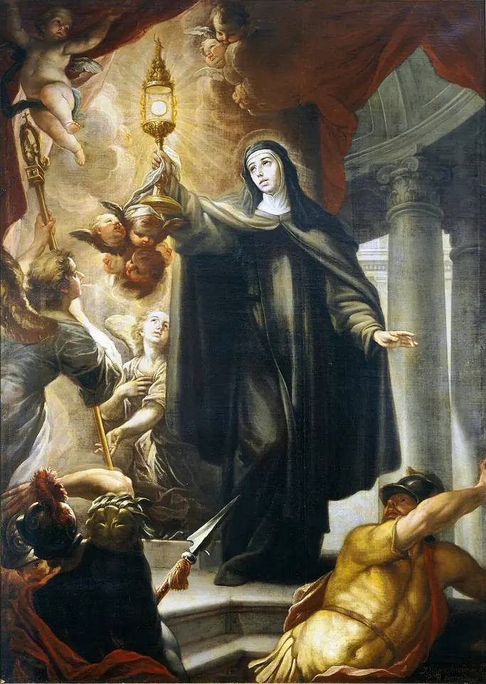 Baroque painting of St. Clare in a dark habit and veil holding up a golden monstrance as angels fly overhead and an armed soldier falls back at her feet