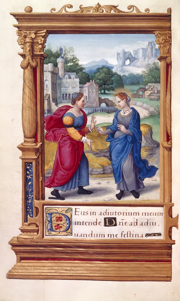 Illuminated manuscript page in a gold architectural frame showing Mary in blue greeting Elizabeth in red before a castle and landscape, above Latin text beginning Deus in adiutorium