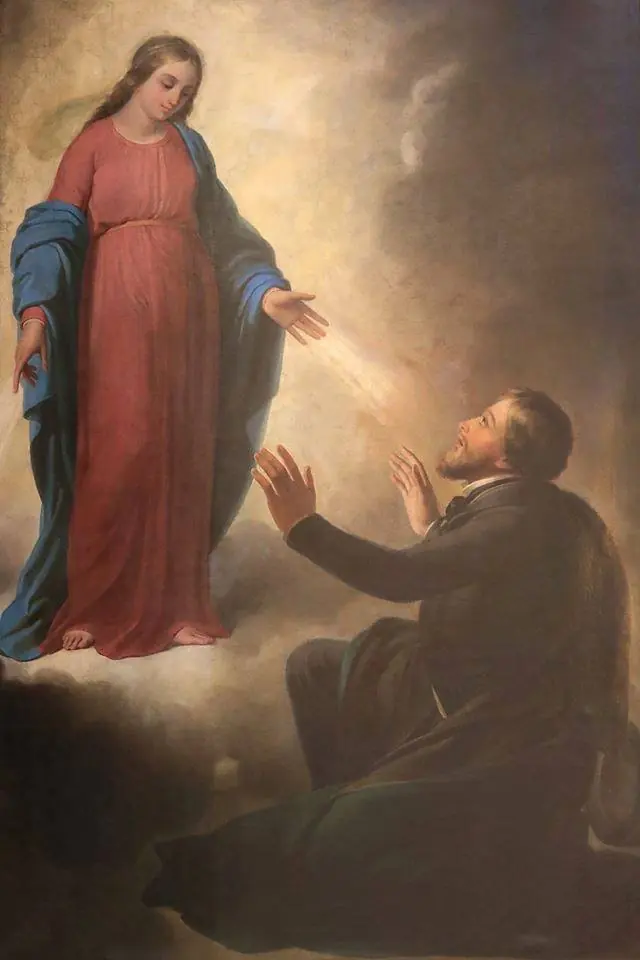 Painting of the Virgin Mary in a red dress and blue mantle appearing on a cloud with rays from her hands to a young man in a dark coat who kneels and raises his hands