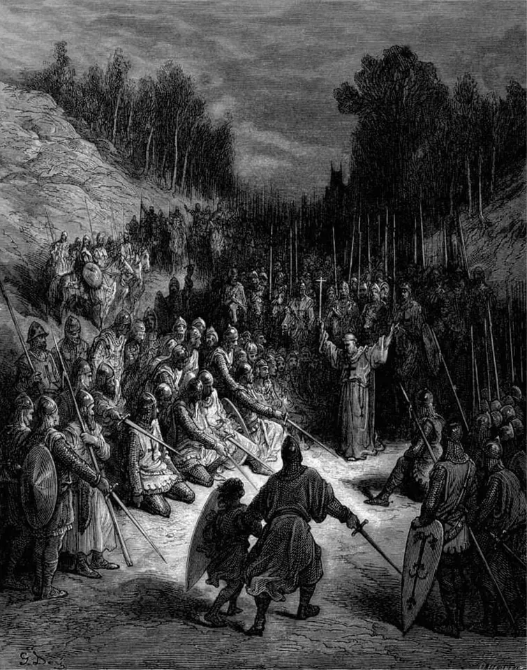 A dramatic black-and-white engraving of a hermit on a rise with his arms raised, preaching to a great crowd of kneeling and armed men in a wooded valley
