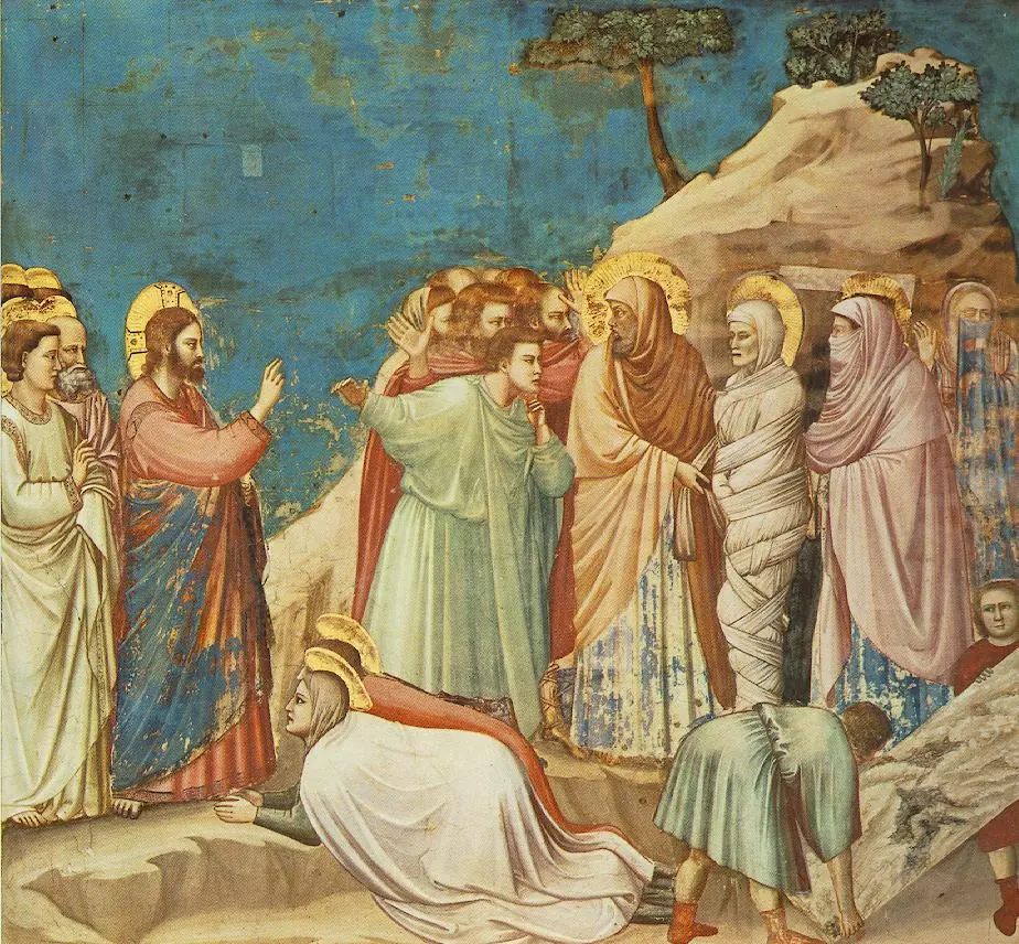 Fresco of Christ raising his hand toward Lazarus, who stands wrapped in grave cloths at the tomb, while his sisters Martha and Mary kneel at Christ's feet