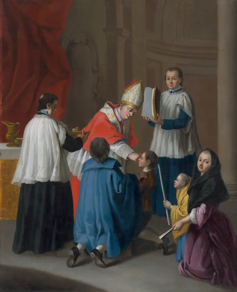 A bishop in a red miter leans from his chair to anoint a kneeling boy whose sponsor stands behind him, with altar boys holding a book and the vessel of chrism