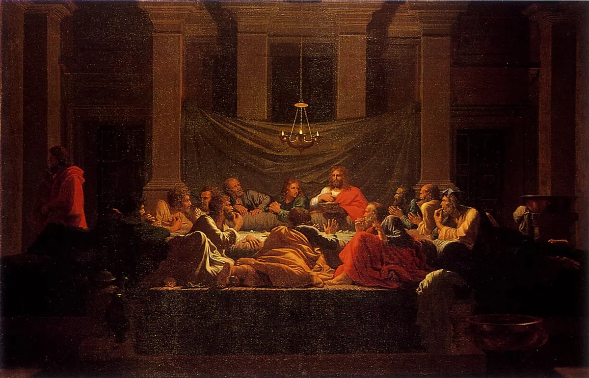 Christ and the apostles recline on couches around a low table in a dim room lit by a hanging oil lamp, at the moment of the Last Supper