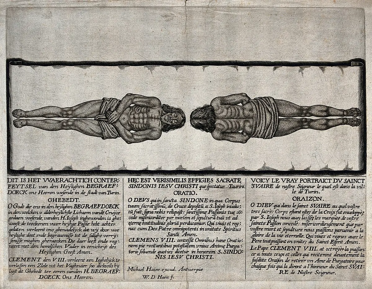 Old engraving of the Shroud showing the front and back figure of Christ laid head to head on a long cloth, with prayers printed below in Dutch, Latin and French