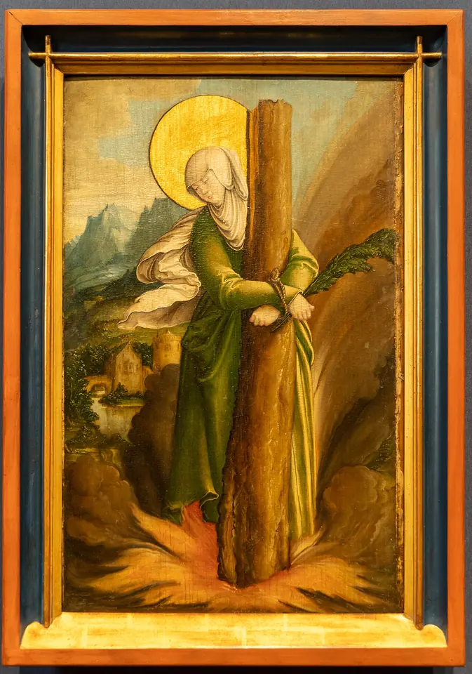 Renaissance panel painting of St. Afra with a halo, bound to a tree trunk with her head bowed, flames at her feet and a palm branch, in a green landscape
