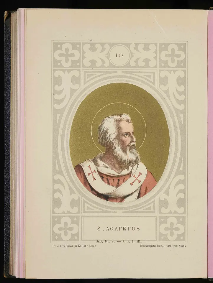 Color print of a white-bearded pope with a halo and a red cope with a pallium in an oval frame on a decorated page, labeled S. Agapetus