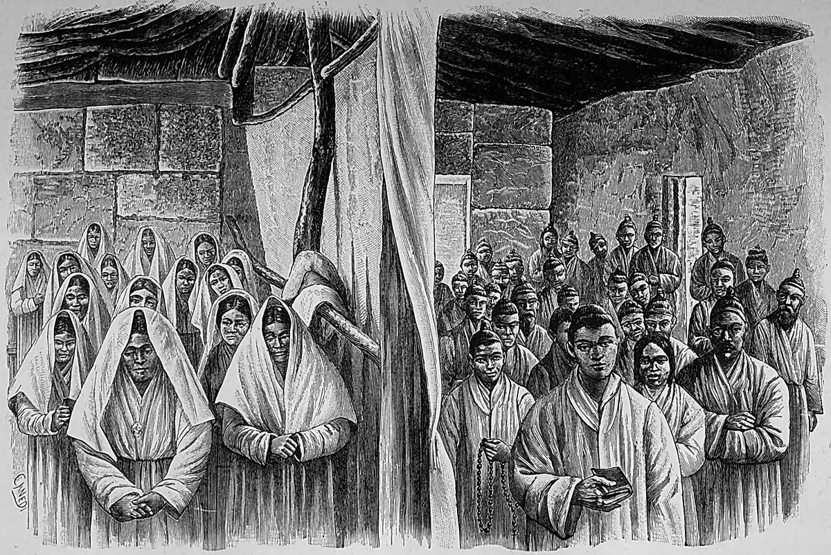 Engraving of Korean Christians at Mass in a plain house, the women on one side with white veils over their heads and the men on the other side, separated by a hanging curtain