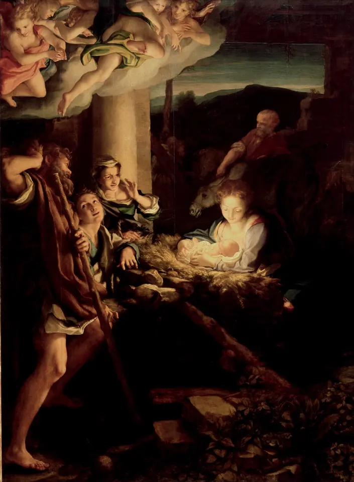 Shepherds crowd around the Virgin Mary at night as light from the newborn Christ in the manger lights up her face, with angels in the clouds above
