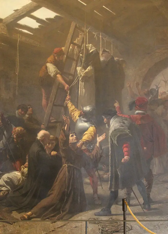 Large 19th-century painting of friars and priests in a dark barn gathered around a ladder as soldiers lead them up one by one, the victims calm and praying
