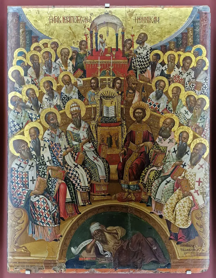 Cretan icon of the First Council of Nicaea showing many haloed bishops seated in rows around the emperor Constantine on a throne, with the heretic Arius lying defeated in a semicircle below