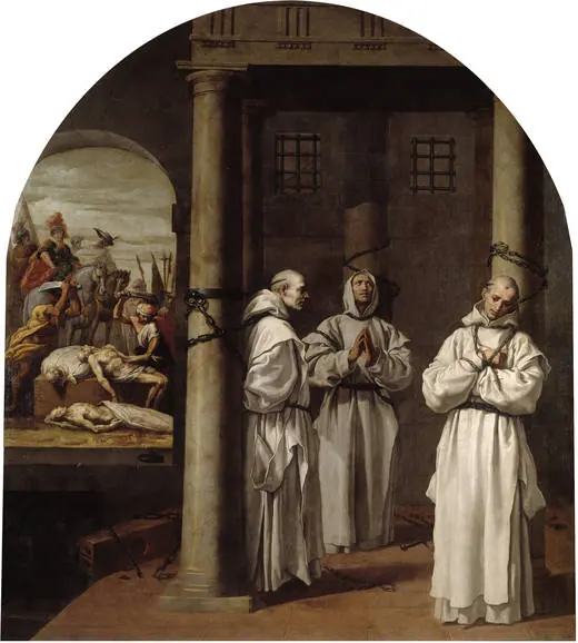 Three monks in white Carthusian habits stand chained to a stone column in a prison courtyard, hands joined in prayer, while through an archway executioners are seen at work on another monk