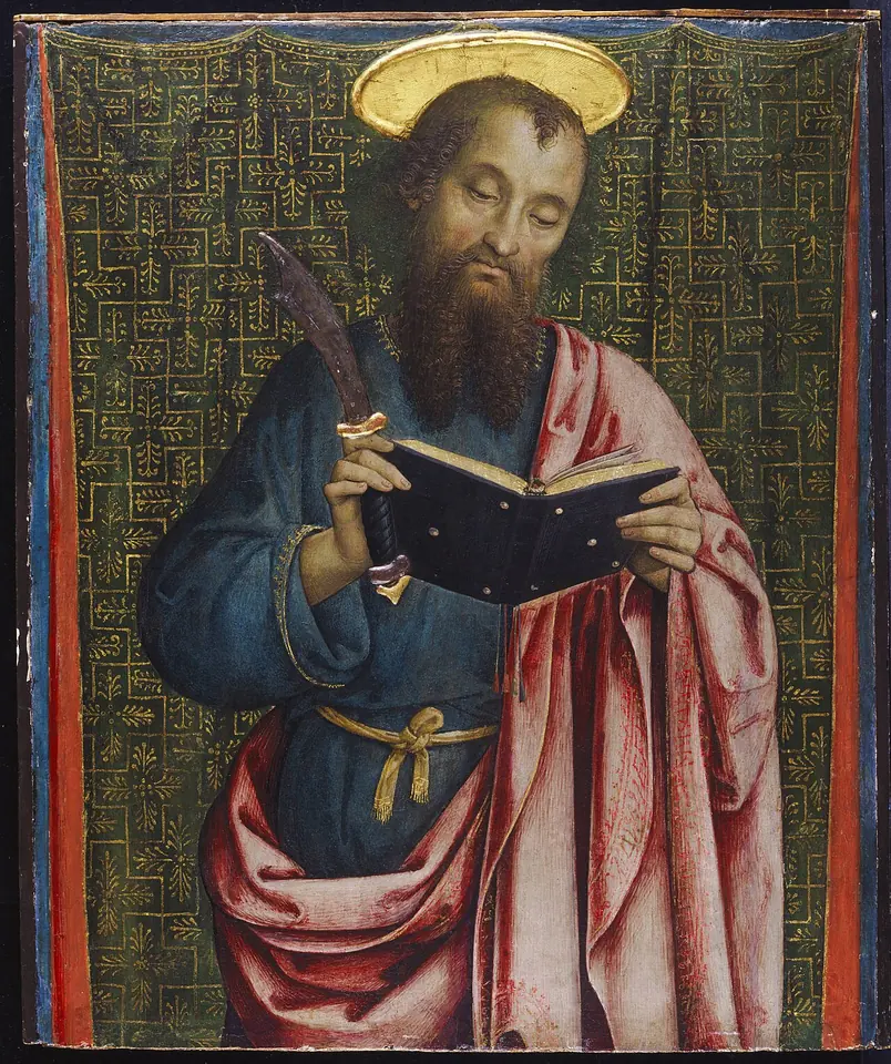 Italian Renaissance panel of a bearded apostle with a gold halo in a blue robe and pink mantle, reading an open book and holding a knife, against a patterned green cloth