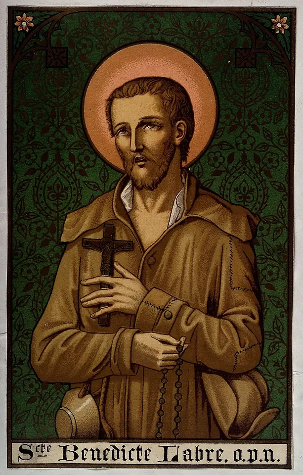Color holy picture of Labre with a gold halo on a green patterned ground, holding a black crucifix and a rosary, a battered hat under his arm
