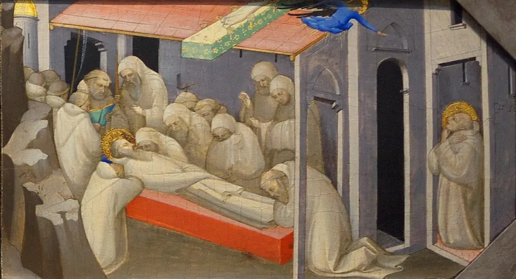 Predella panel of monks in white gathered around Benedict's body laid on a bier, with an angel above the roof of the chapel