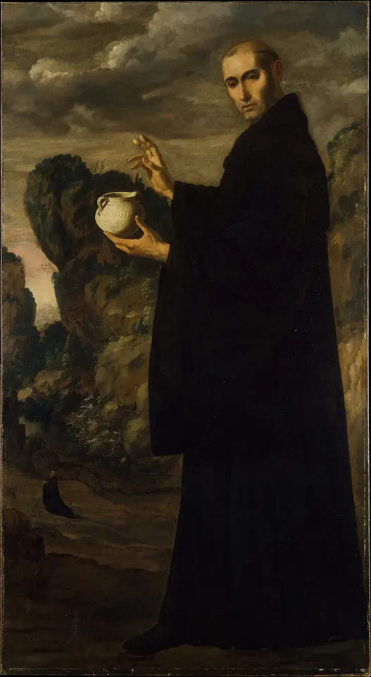Full-length painting of St. Benedict in a black habit raising his right hand in blessing over a cracked white earthenware jug, in a rocky landscape