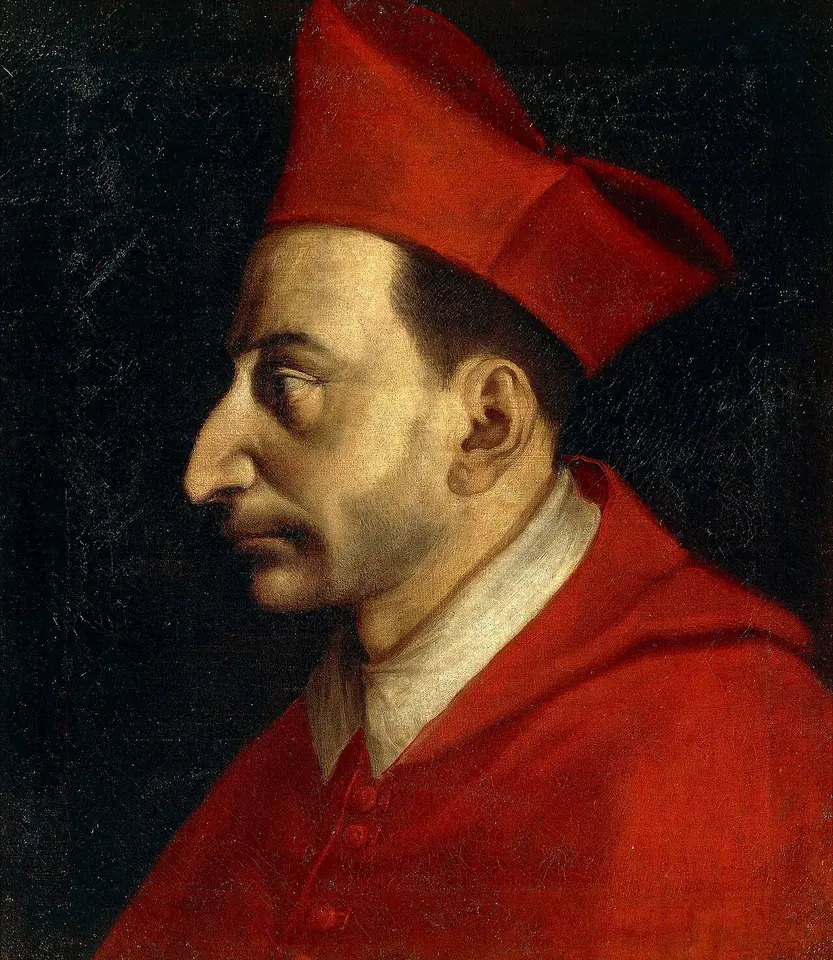 Profile portrait of Charles Borromeo in a red biretta and red cardinal's robes, showing his long hooked nose and thin face against a dark background