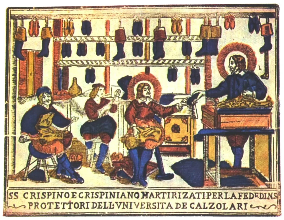 Brightly colored folk print of a shoemaker's shop with shoes hanging from the ceiling and two haloed saints working among other cobblers, captioned as protectors of the guild of shoemakers