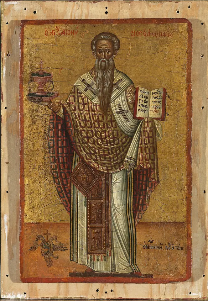 Cretan icon of a gray-bearded bishop in rich vestments standing on a gold ground, holding an open book and a small vessel