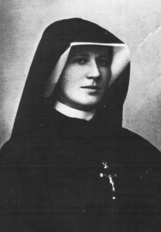 Black-and-white head-and-shoulders photograph of Sister Faustina in a black veil and white coif, with a small crucifix on her habit