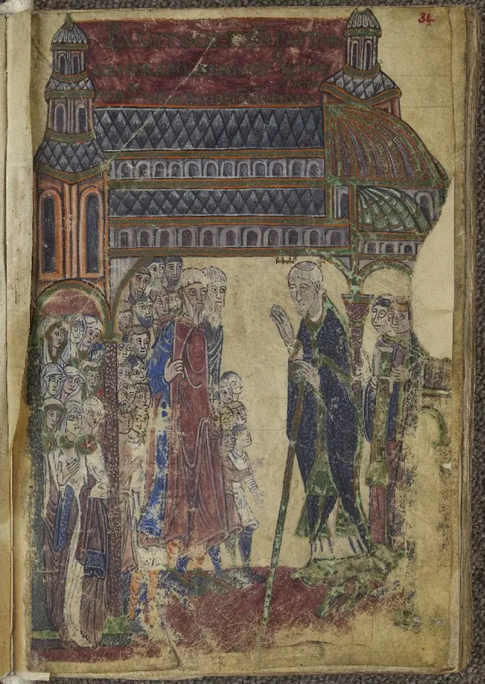 A medieval manuscript painting of a bishop with a crozier speaking to a crowd of people standing beneath a long church with towers and a patterned roof