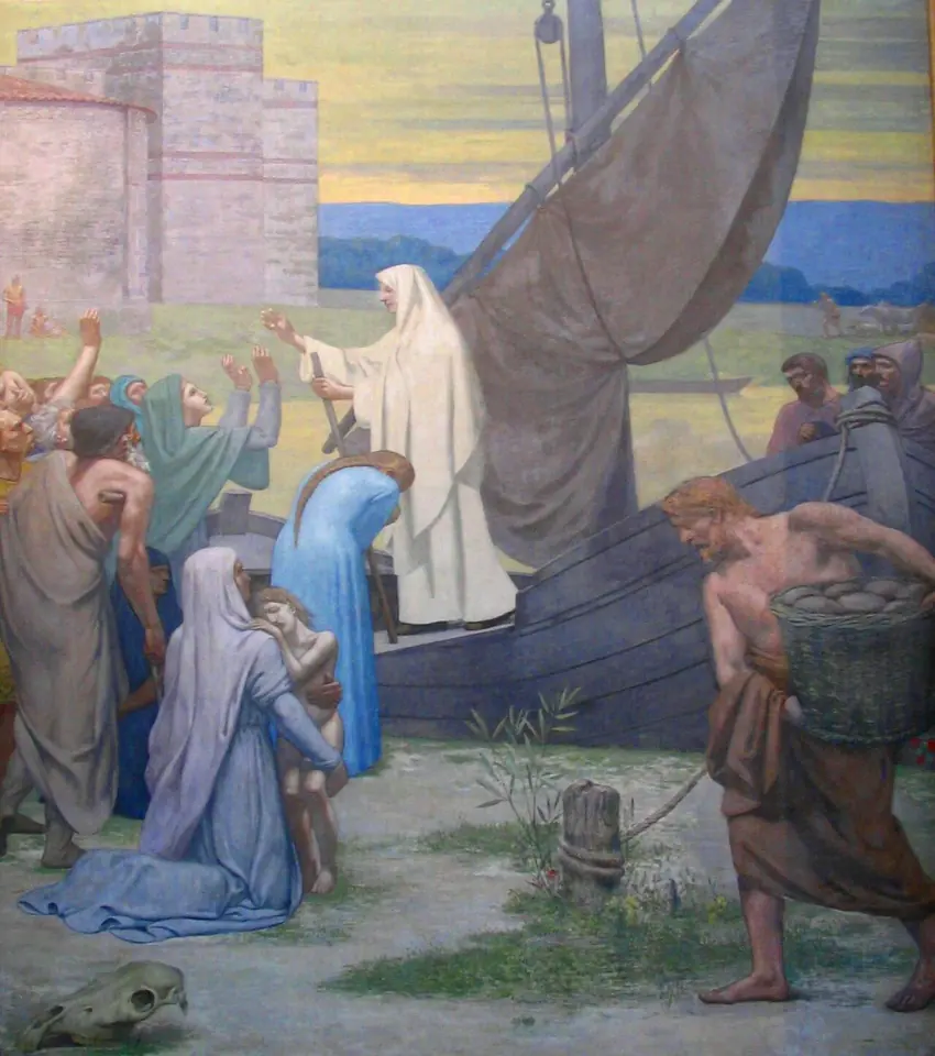 Mural of a tall woman in a white veil standing beside a moored boat as men unload baskets of food and kneeling women and children reach up to her