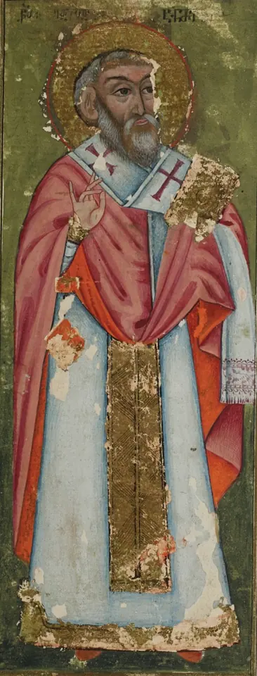 Georgian miniature of a haloed elderly saint with a white beard in a red cloak over pale vestments with a stole marked with crosses, blessing with his right hand