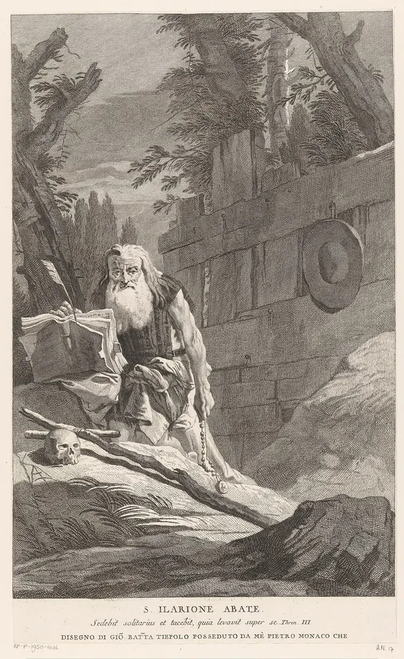 Engraving of an old bearded hermit seated with a book in front of a ruined stone wall, a hat hanging on the wall and a skull at his feet