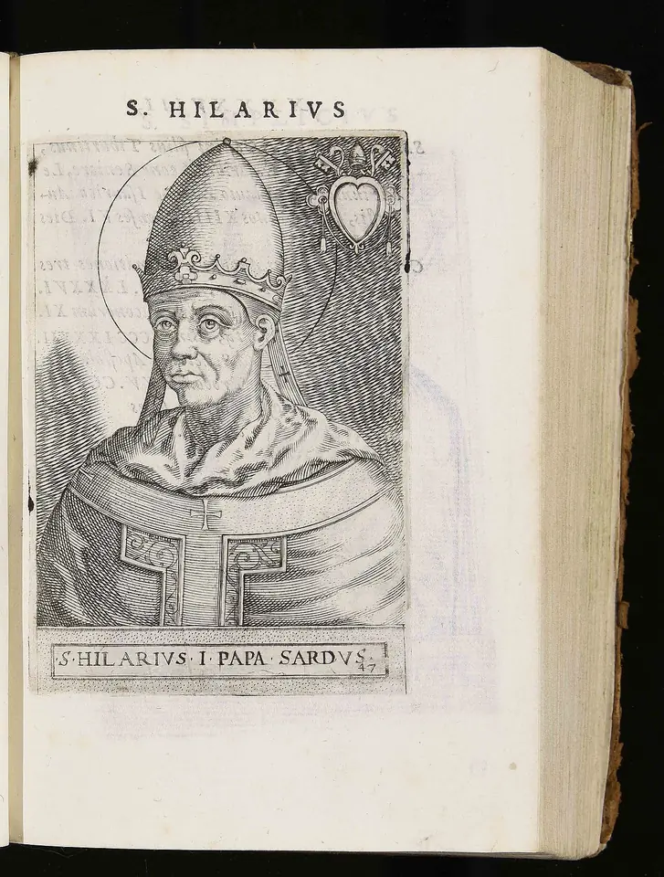 Engraved portrait in an open old book of a pope in a pointed tiara and pallium, captioned S. Hilarius I Papa Sardus