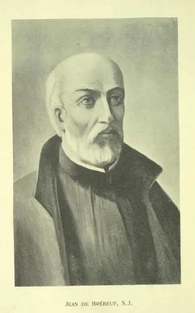 Engraved portrait of an older Jesuit priest with gray hair and a full beard, in a black cassock and cloak, captioned Jean de Brébeuf, S.J.