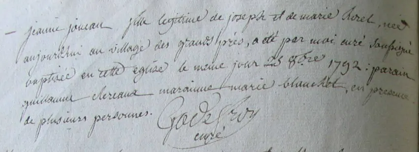 Handwritten French entry in an old parish register recording the baptism of Jeanne Joucan on October 25, 1792, with the priest's signature