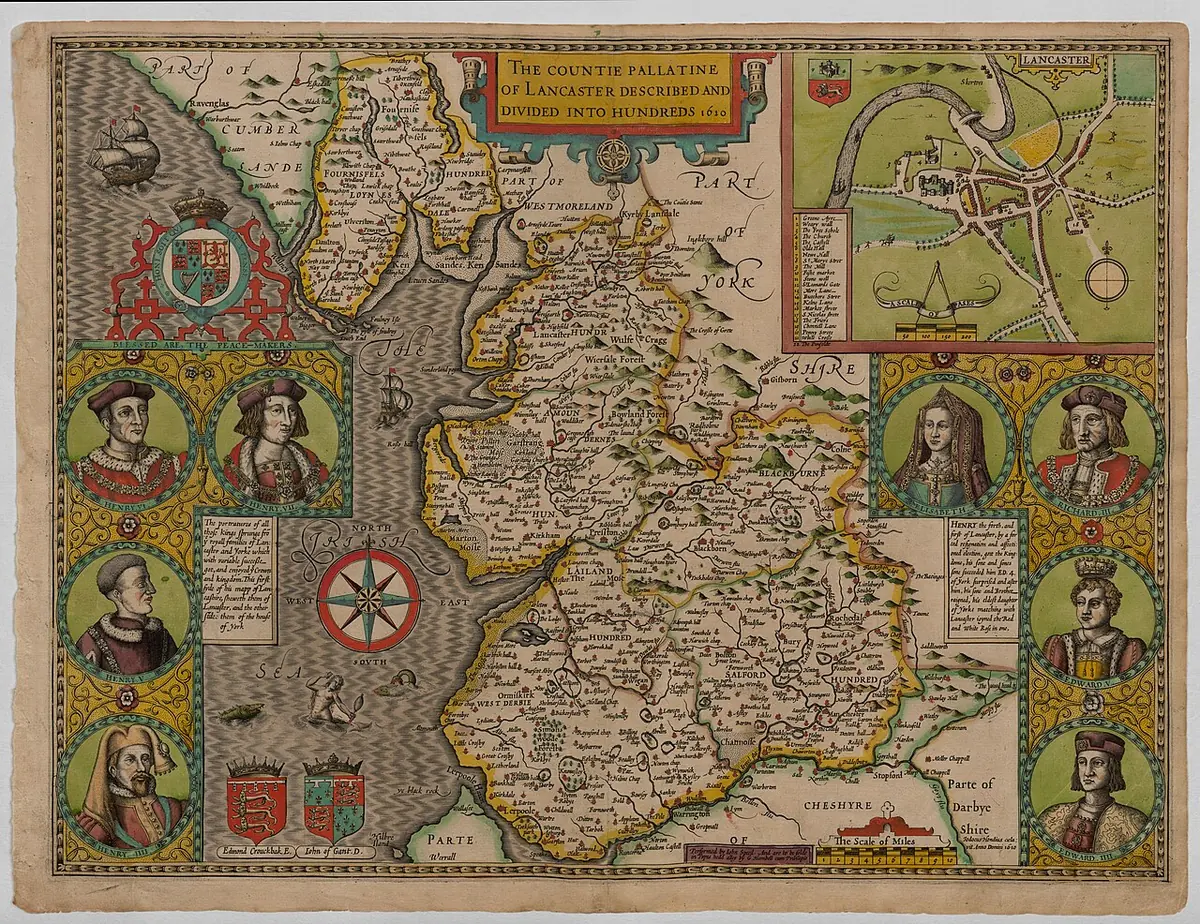 A hand-colored map of Lancashire from 1610, bordered by small portraits of kings and with an inset plan of the town of Lancaster