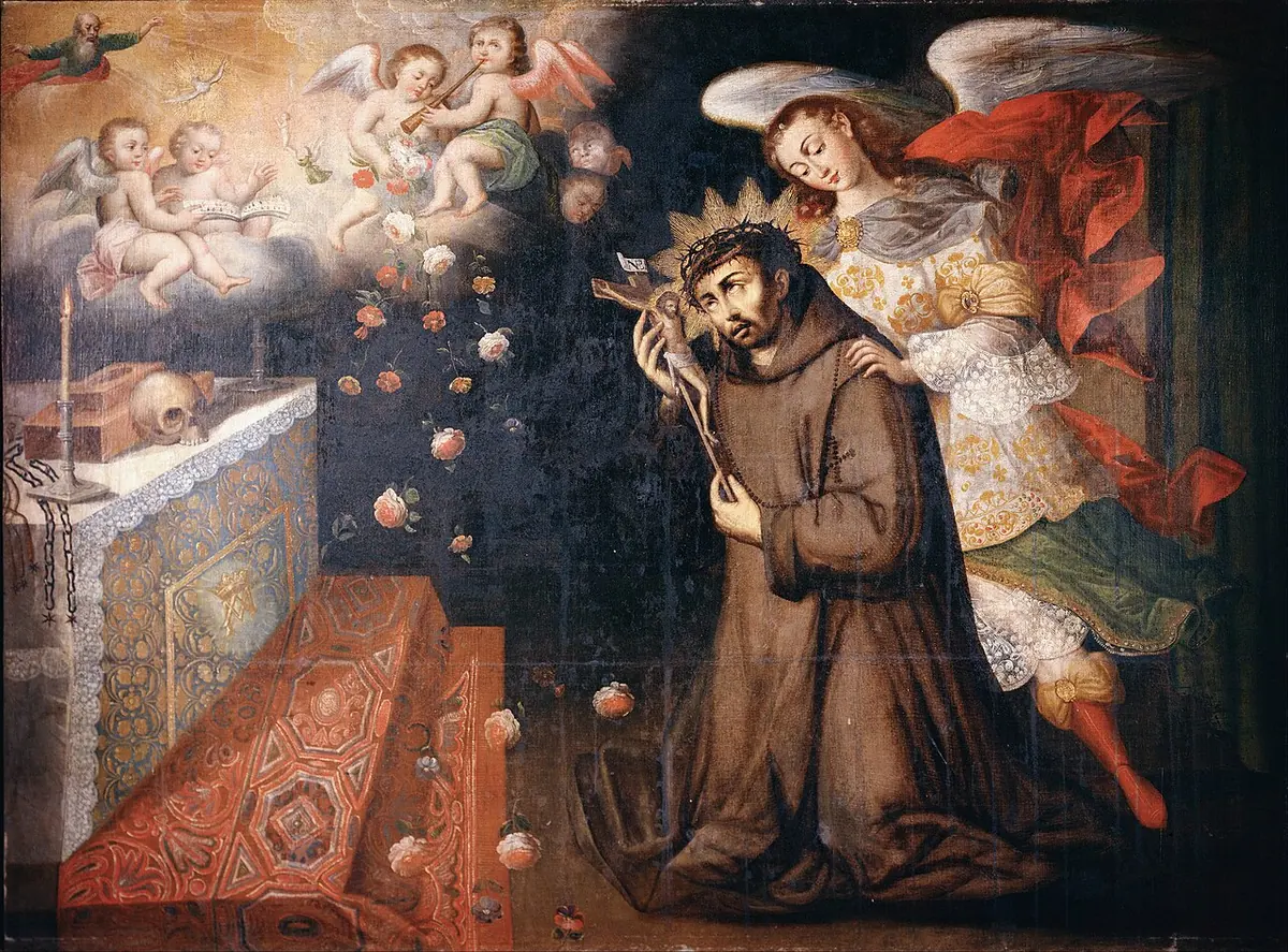 Colonial Peruvian painting of John of God kneeling in a brown habit, wearing a crown of thorns and holding a crucifix, as an angel supports him and cherubs scatter pomegranates and flowers from above