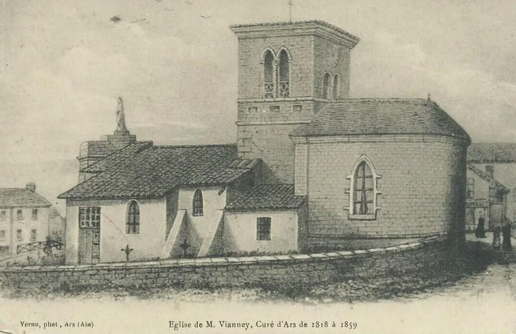 Old black-and-white print of a small country church with a square stone bell tower and a low tiled roof