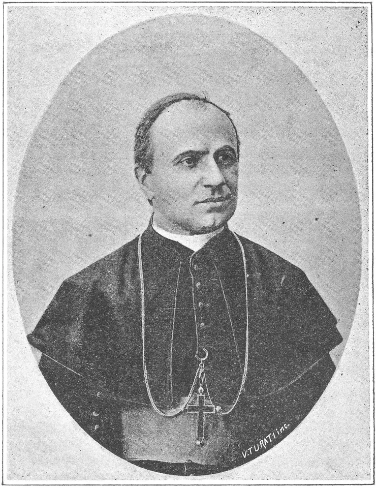 Oval black-and-white portrait of a bishop in his forties with a broad face and receding hair, wearing a mozzetta and a pectoral cross on a chain