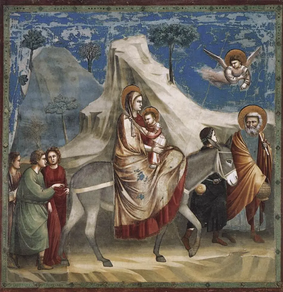 Fresco of Mary riding a donkey with the Child in her arms through rocky hills, the donkey led by a young man in black, with a gray-bearded Joseph walking ahead carrying a gourd, companions following and an angel flying overhead